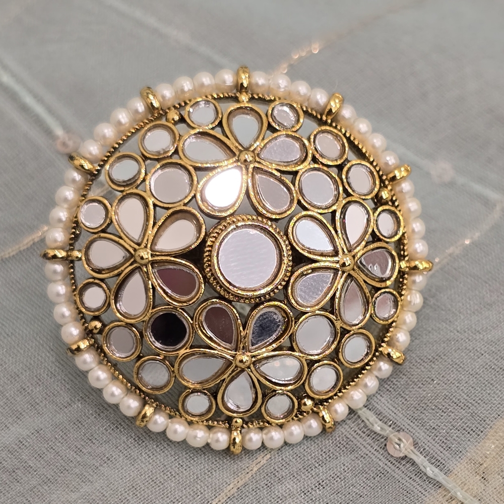 Elegant Gold and White Brooch